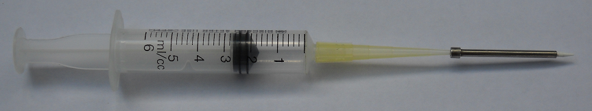 cleaning Xtend microarray pin with syringe