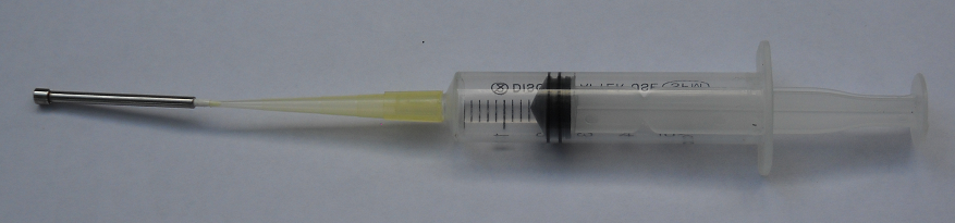 cleaning Xtend microarray pin with syringe